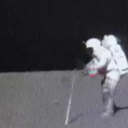 An astronaut drops a hammer from 2.0